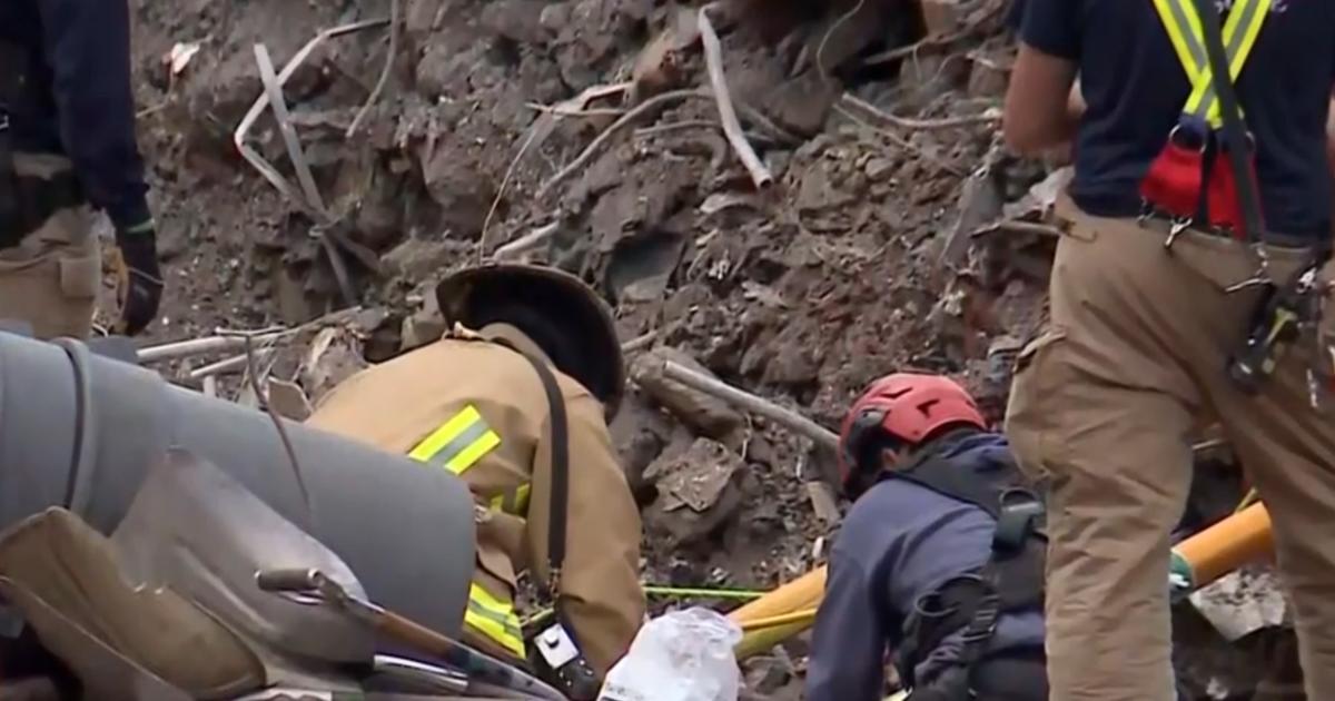 Person trapped beneath building collapse rubble, Kentucky officials say